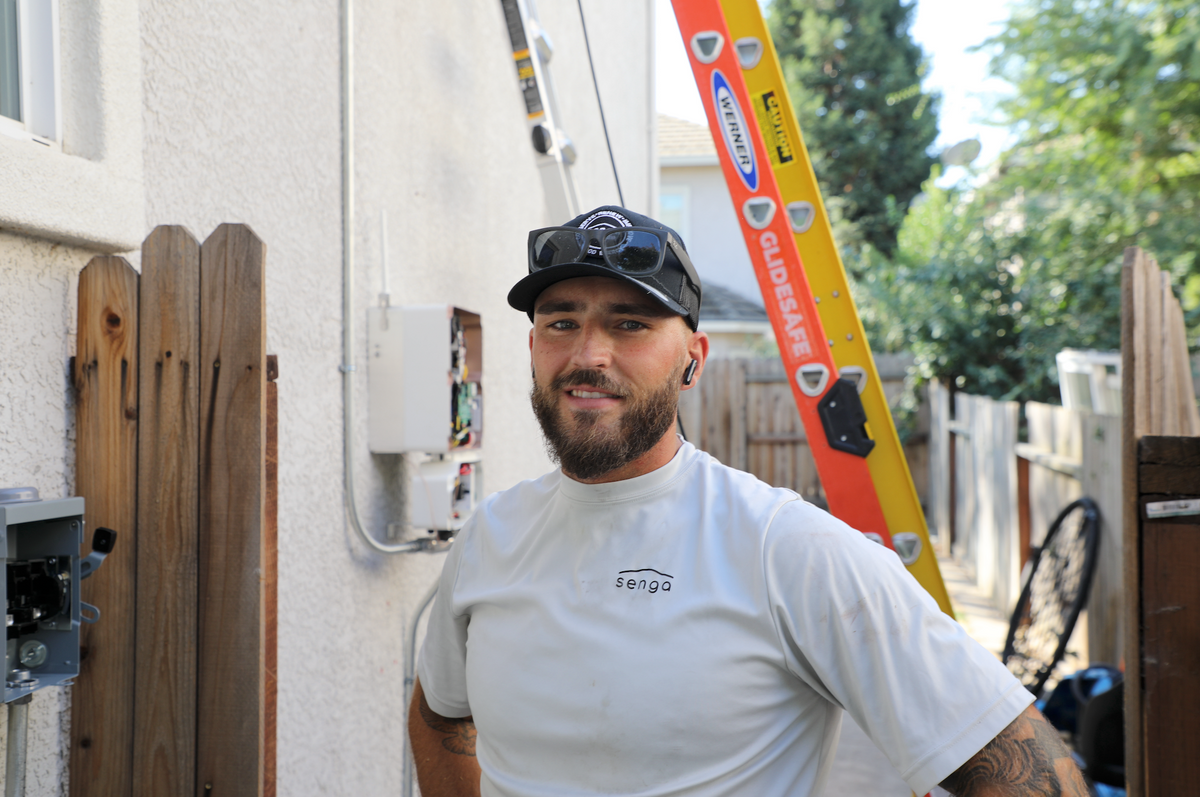 Senga Energy technician installing residential solar equipment in California for a homeowner evaluating whether a solar PPA places a lien on their home
