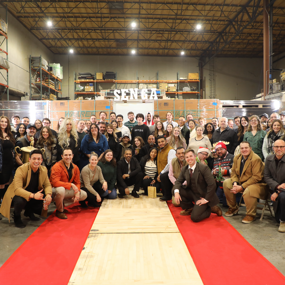 Senga Energy team group photo celebrating customer success and five-star reviews for solar, battery, windows, and roofing installations in California