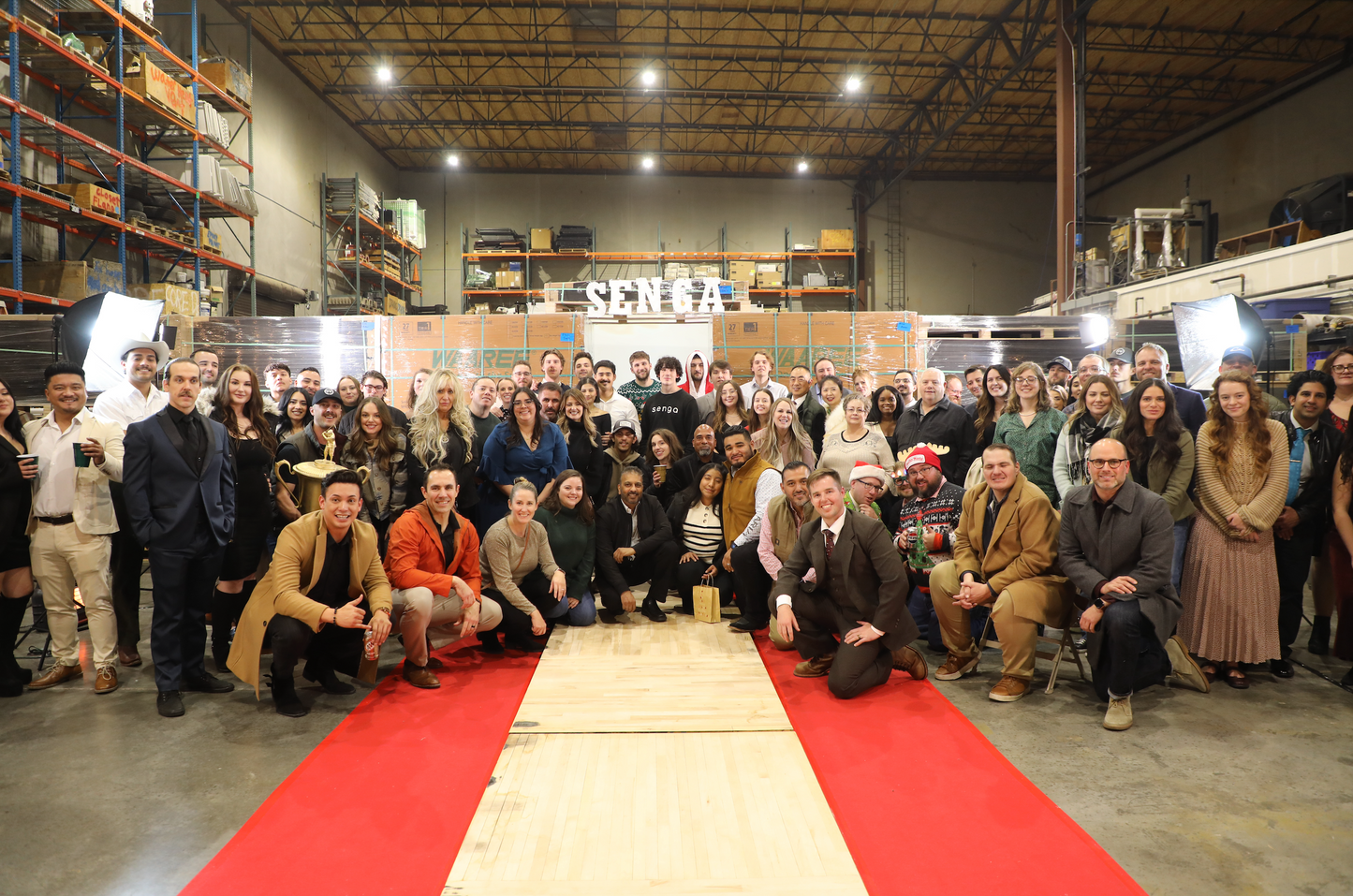 Senga Energy team group photo celebrating customer success and five-star reviews for solar, battery, windows, and roofing installations in California